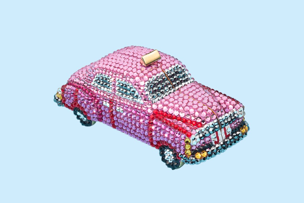 A pink car covered in rhinestones